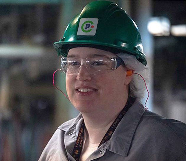 Canada Packers team member with safety goggles.